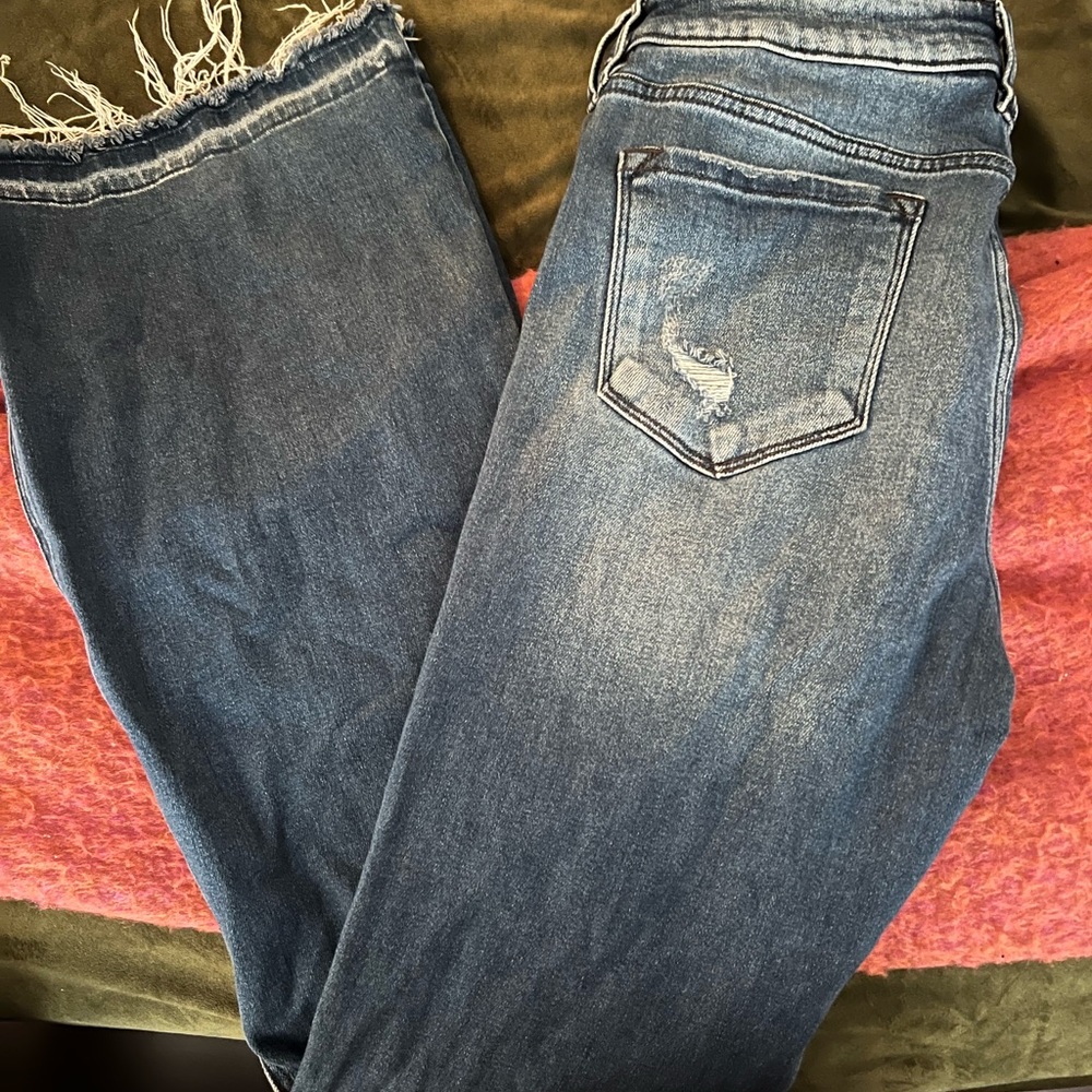 Kancan flare distressed jean! 15/31 has the darker denim strip along side!